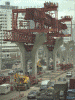Lifting 'The Helicopter' Launching Girder in Columns with special Lifting Device 'Bang-Na-Trad Highway Project' Bangkok klick to enlarge